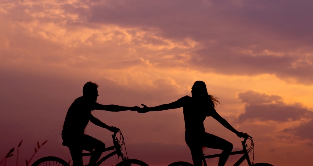 Couple on bicycles