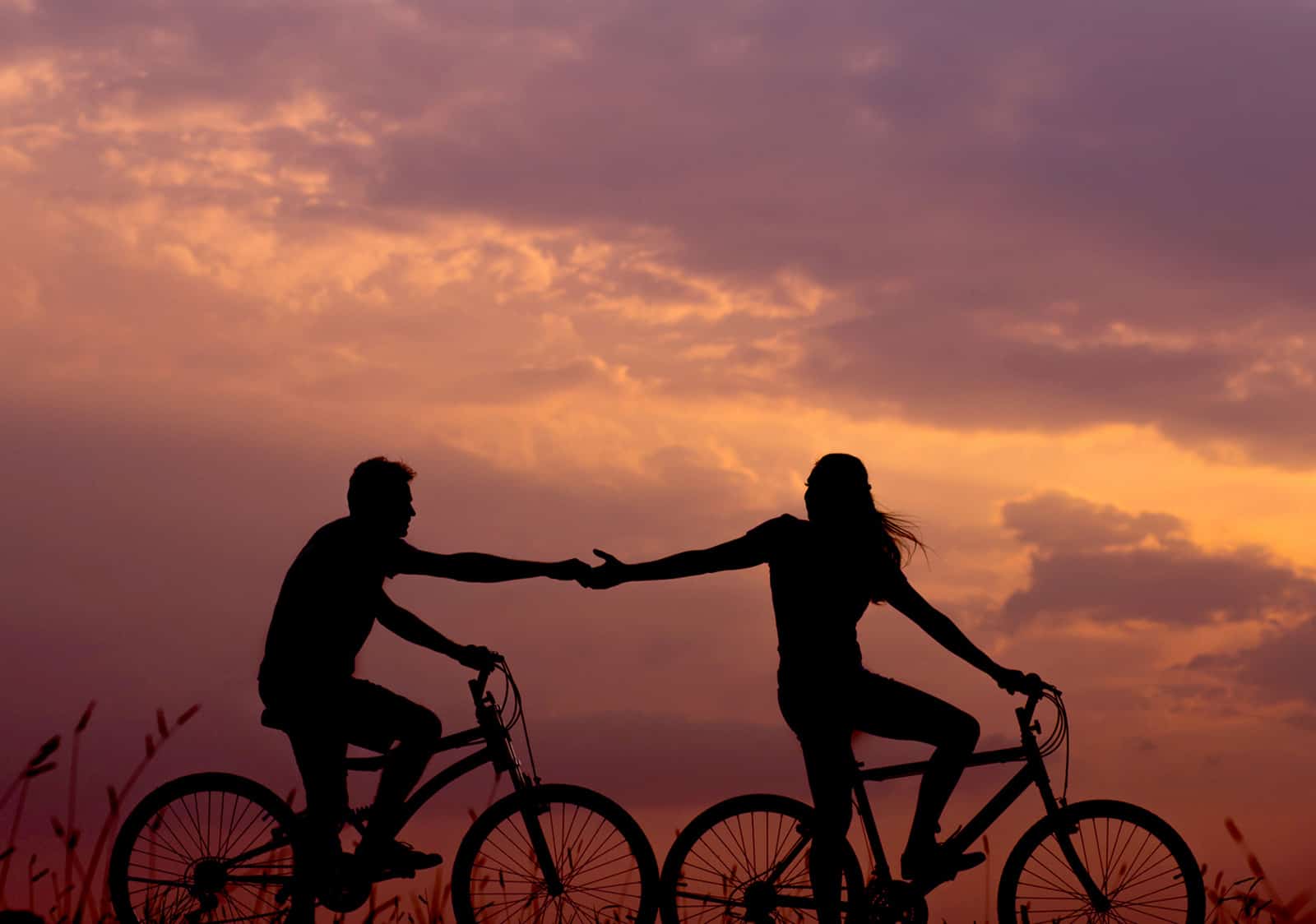 Couple on bicycles